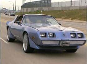Purple Pontiac Trans Am after its makeover