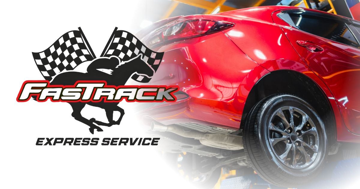FasTrack Express Service logo next to a red car raised on a service lift