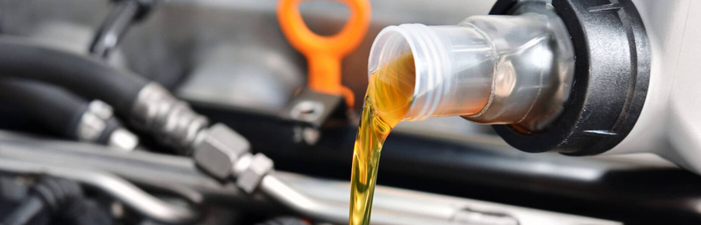 a car owner learning how often to change their oil