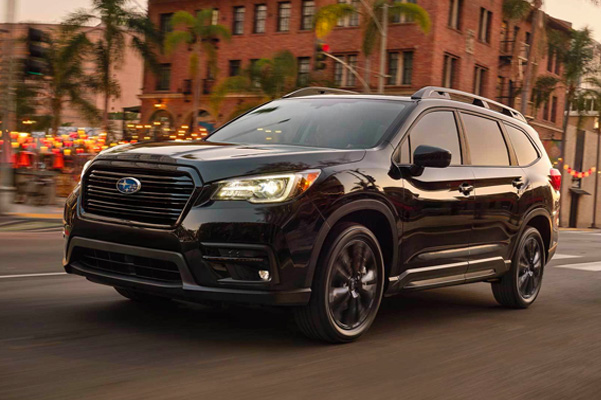 front corner view of the 2022 Subaru Ascent driving along city road