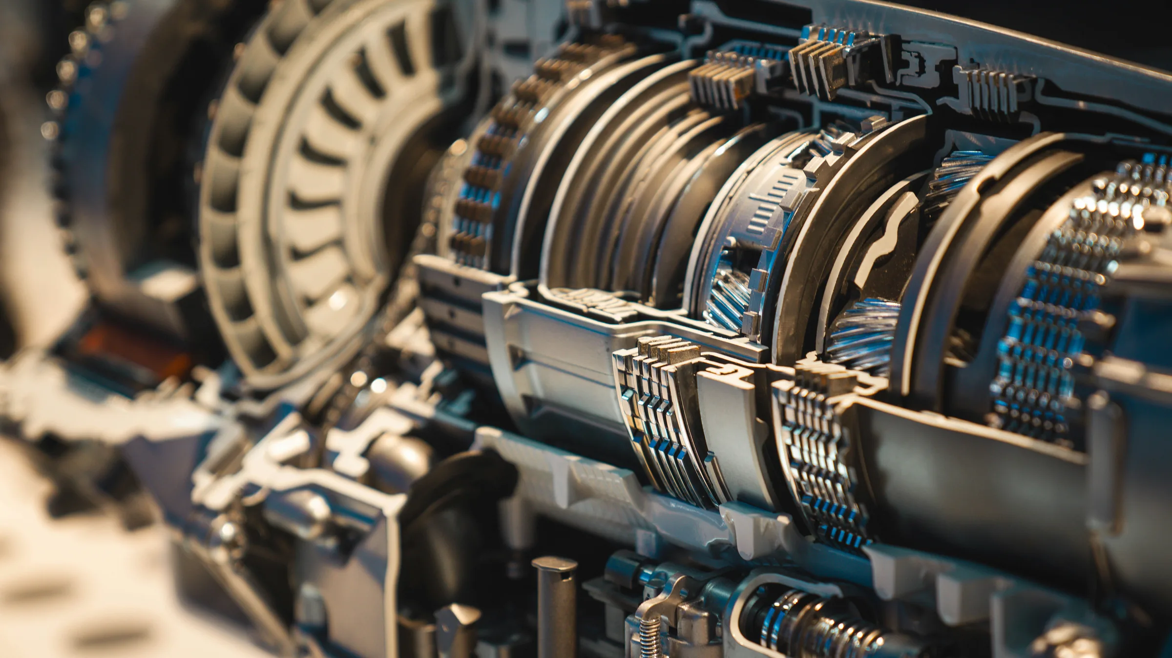 Close-up of a cutaway automatic transmission showing its internal clutch packs and gears. Transmission Service in Kansas City, KS