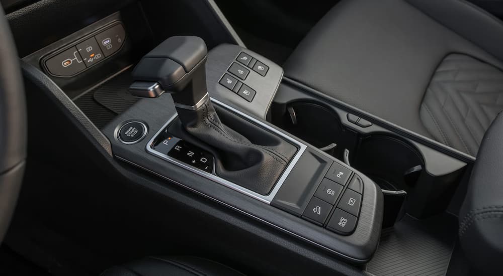 Center console and shifter in a 2026 Kia Sportage Hybrid