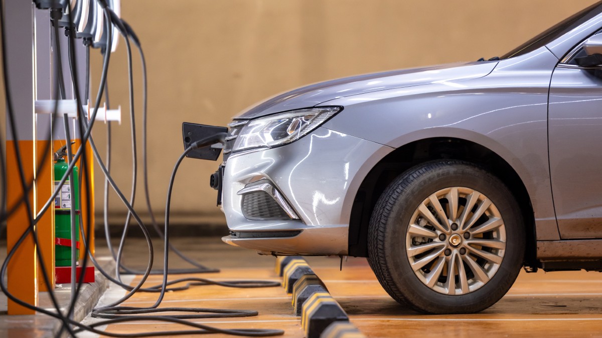 Electric Vehicle Plugged In and Charging