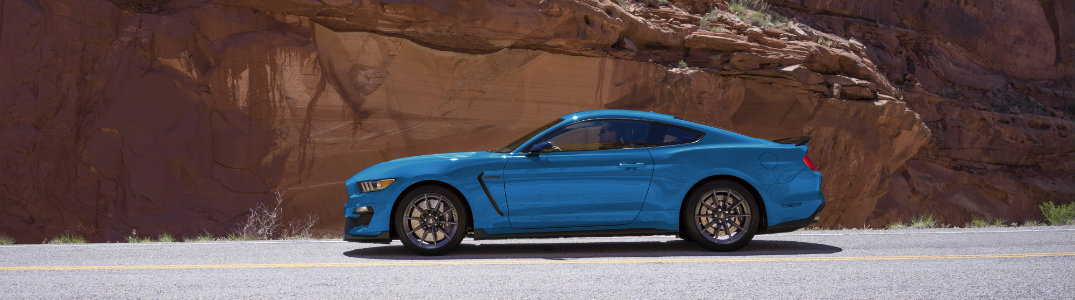 2017 Ford Mustang side view blue