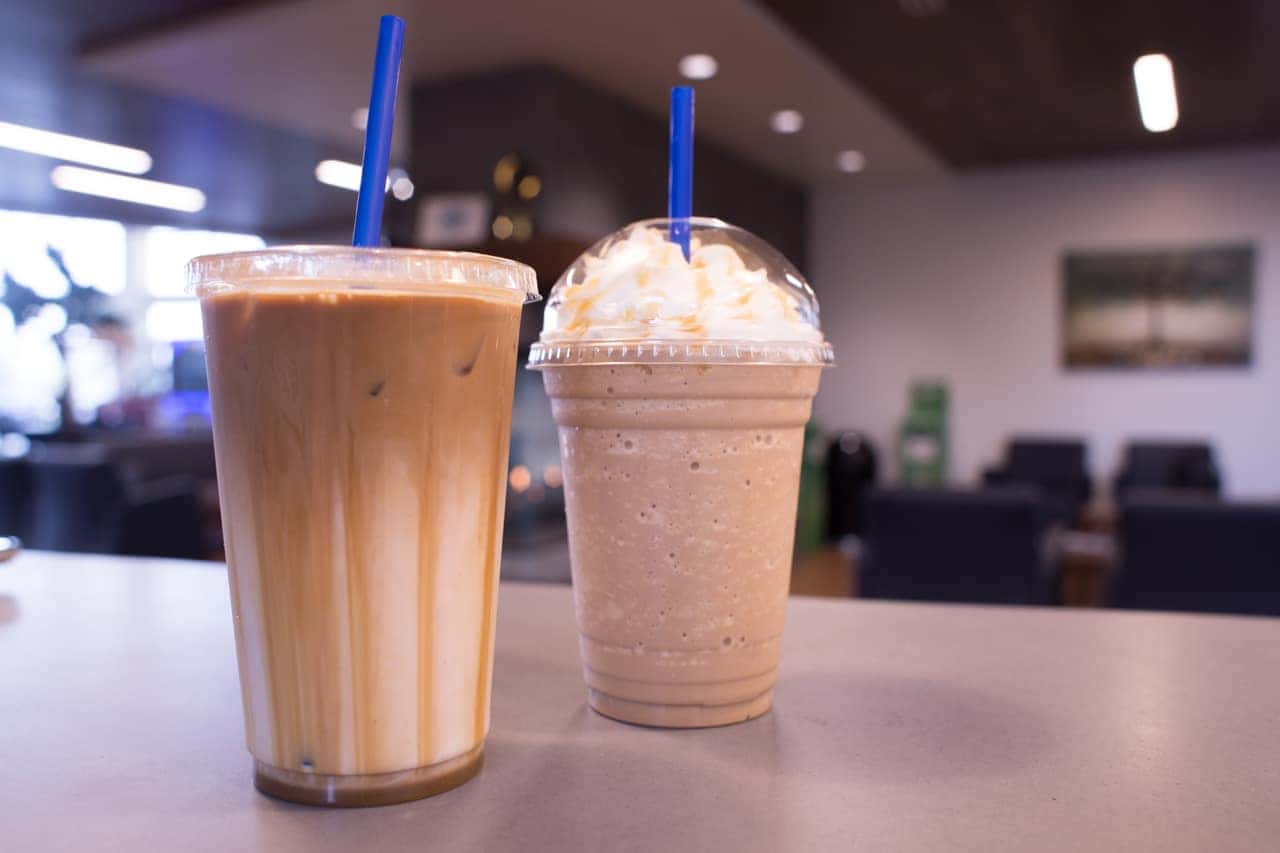 Iced latte and blended coffee drink with whipped cream at the Outback Café