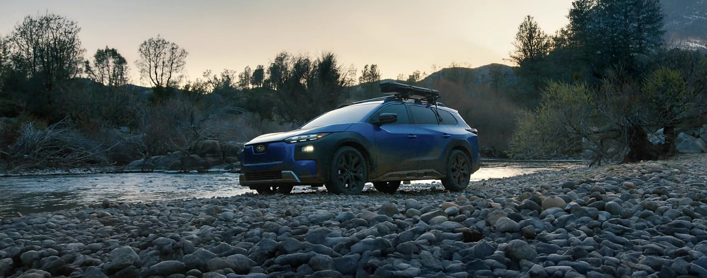 Blue 2026 Subaru Trailseeker parked near a river