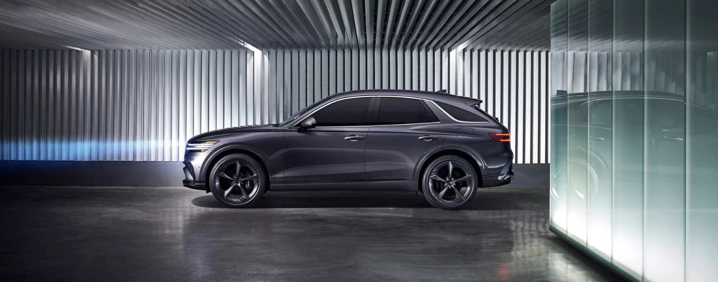 Side profile of a grey 2026 Genesis GV70 for sale