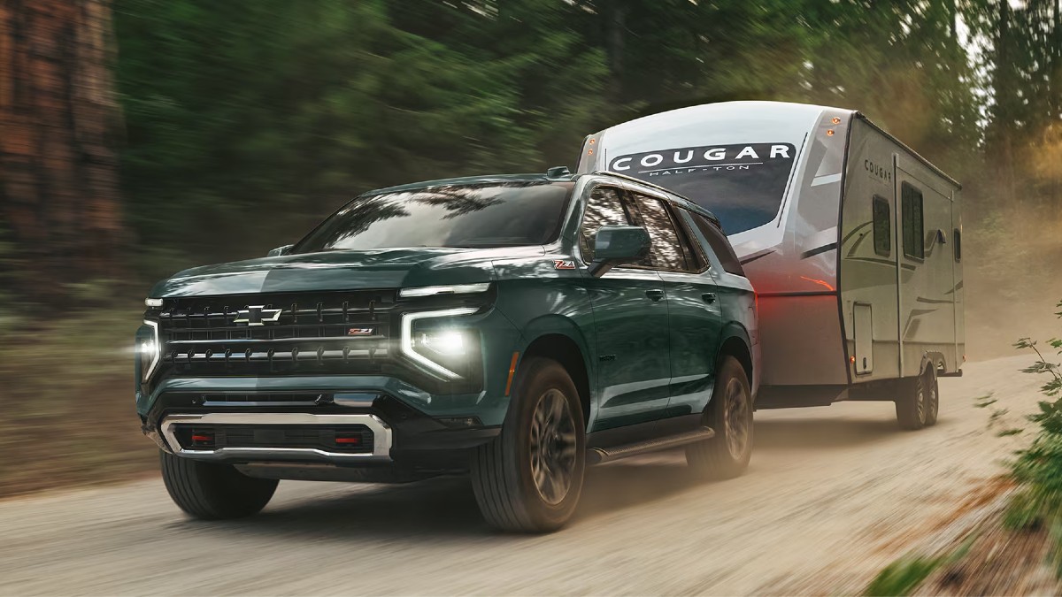 2026 Chevy Tahoe Exterior Driver Side Front Angle while Towing a Camper
