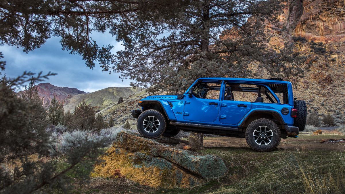 2025 Jeep Wrangler 4xe Exterior Driver Side Profile on Trail