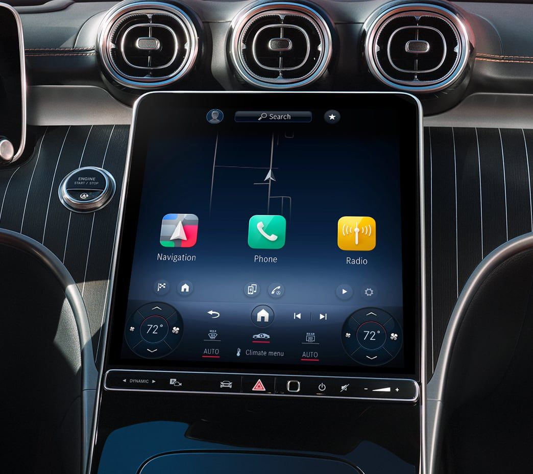 2026 Mercedes-Benz C-Class MBUX portrait touchscreen showing navigation, phone, and radio apps
