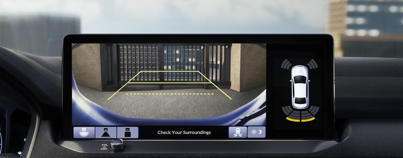 Back-up camera on a 2026 Honda Accord hybrid showing a gate.