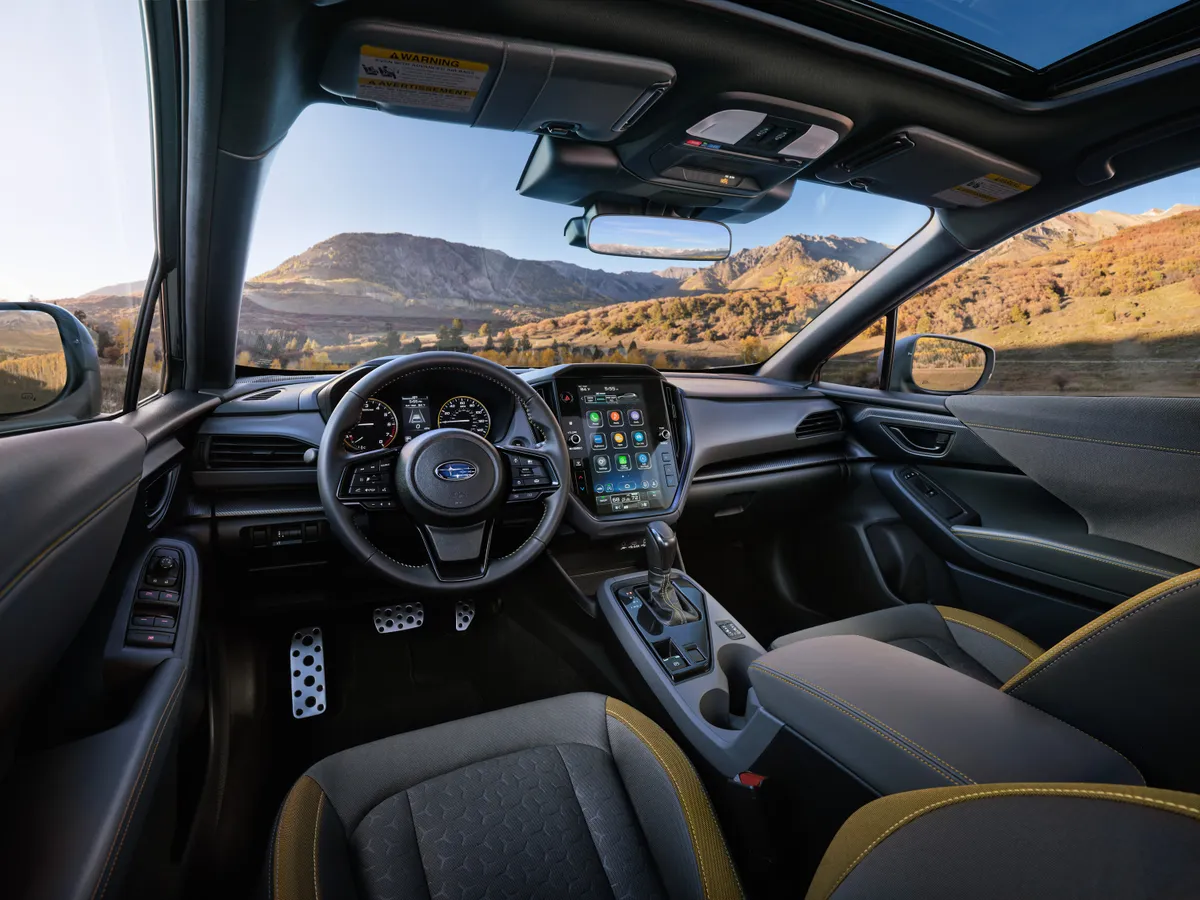 2024 Subaru Crosstrek interior with 11.6-inch touchscreen and mountain view