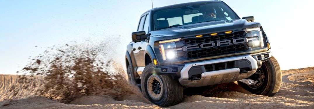 2024 Ford F-150 Raptor Turning Up Sand in a Desert