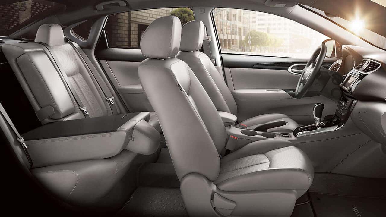2017 Nissan Sentra gray leather front seats seen through the driver door