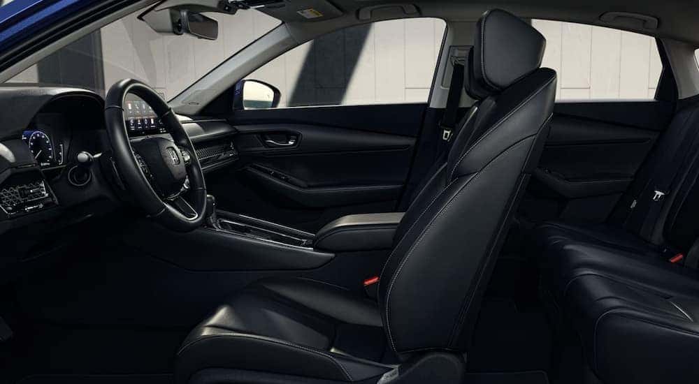 The black interior and dash in a 2024 Honda Accord for sale in Rochester is shown.