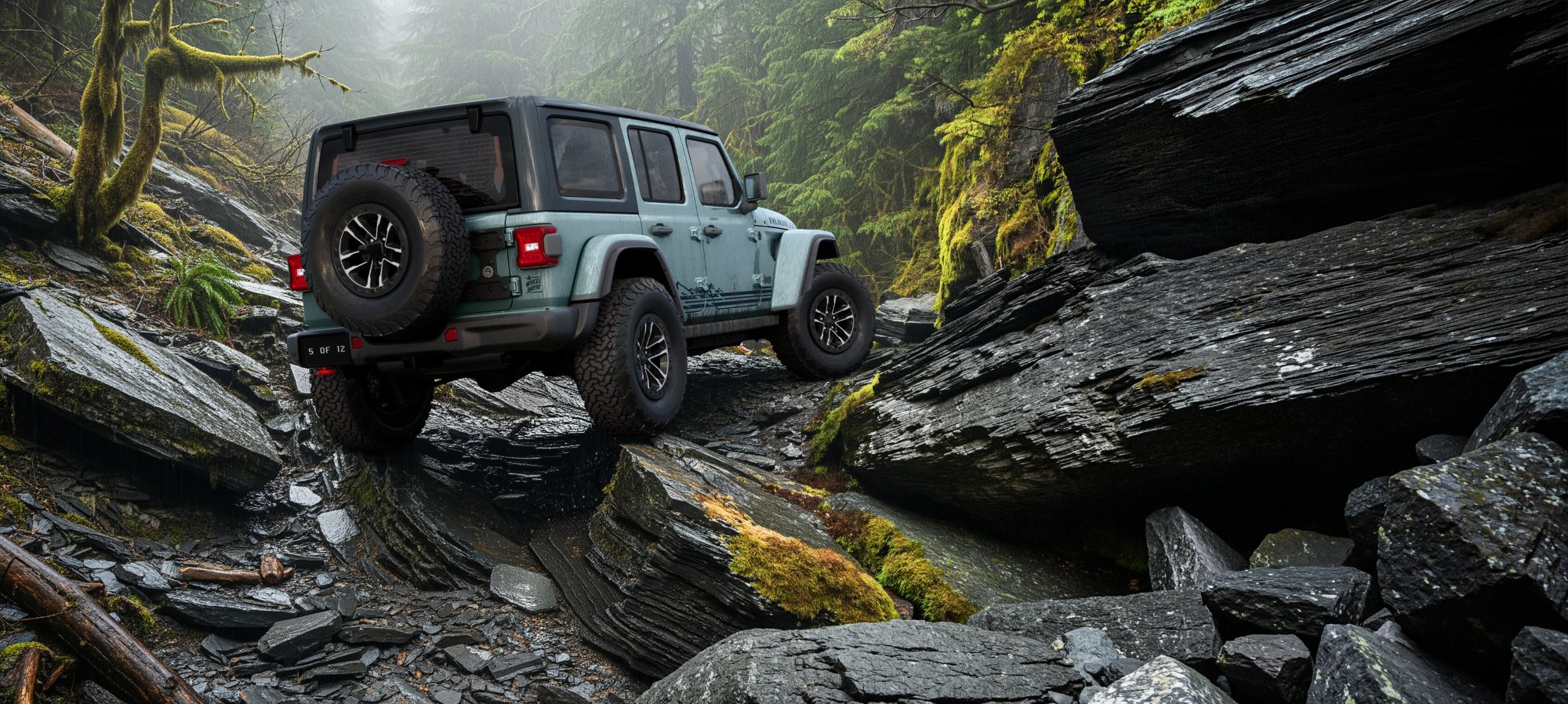 Gray 2026 Jeep Wrangler with a hardtop crawling over wet rocks in a forest