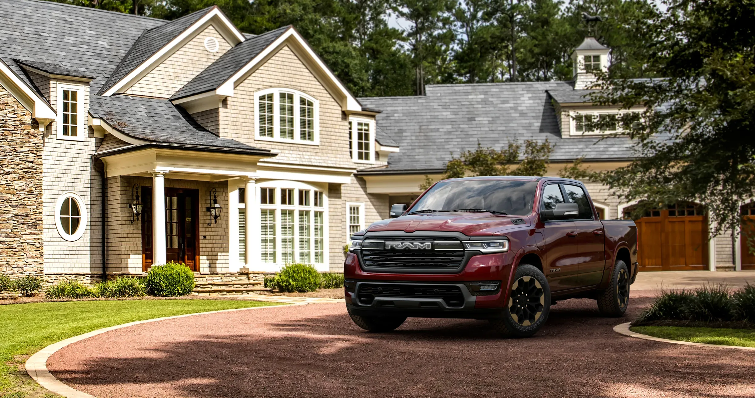 Red Ram pickup truck parked in the driveway of a house