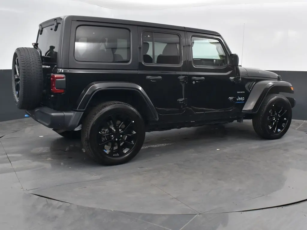 Used 2023 Jeep Wrangler 4xe Sahara 4XE with VIN 1C4JJXP62PW641467 for sale in East Moline, IL