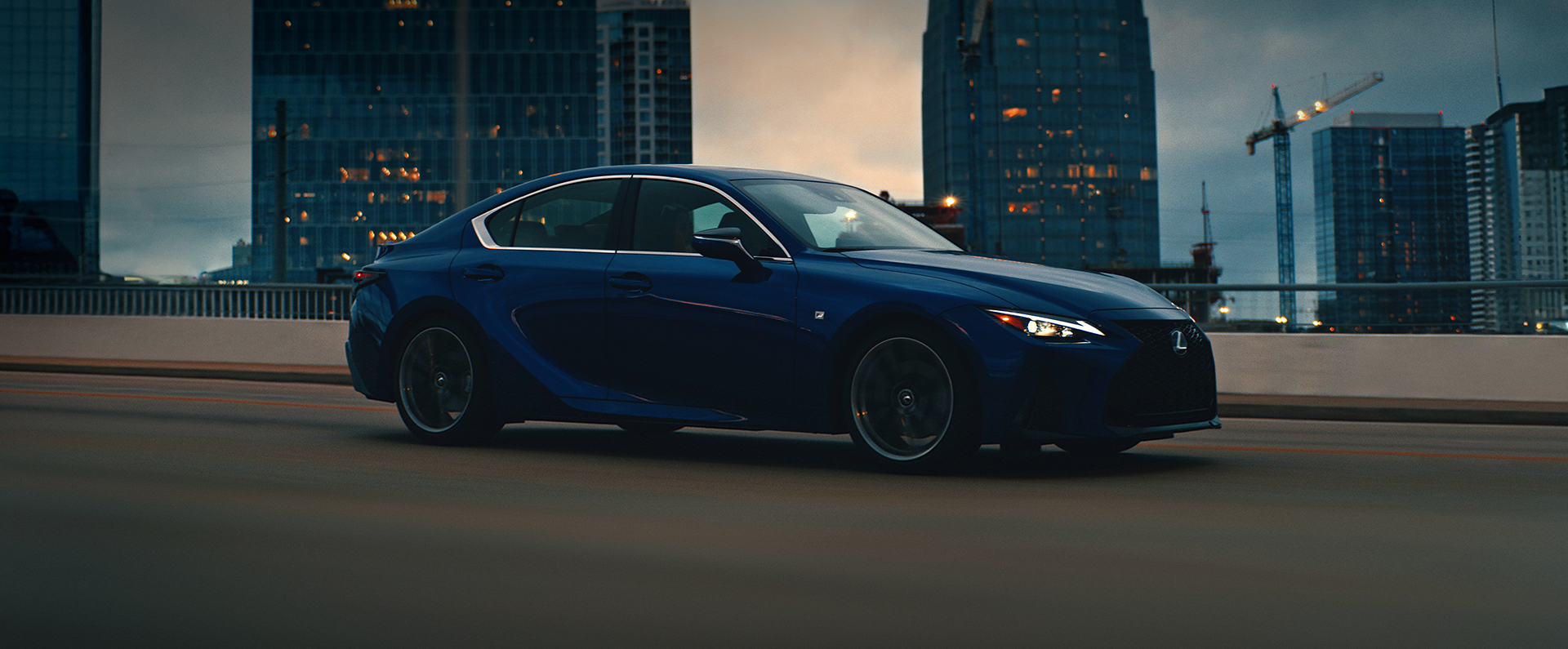 Exterior of the Lexus IS 350 F SPORT shown in Ultrasonic Blue Mica 2.0.