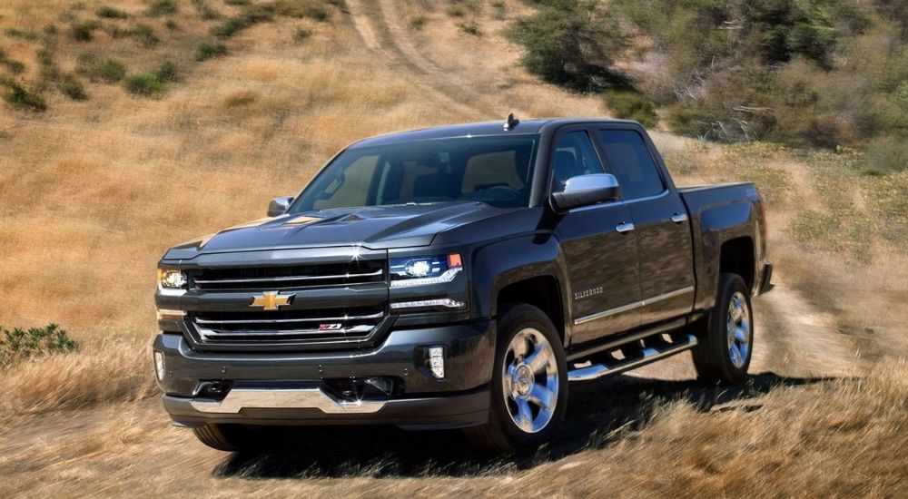 The gauges and black dash are shown in a 2022 Chevy Silverado 1500 RST.