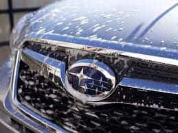Soapy Subaru grille during a car wash