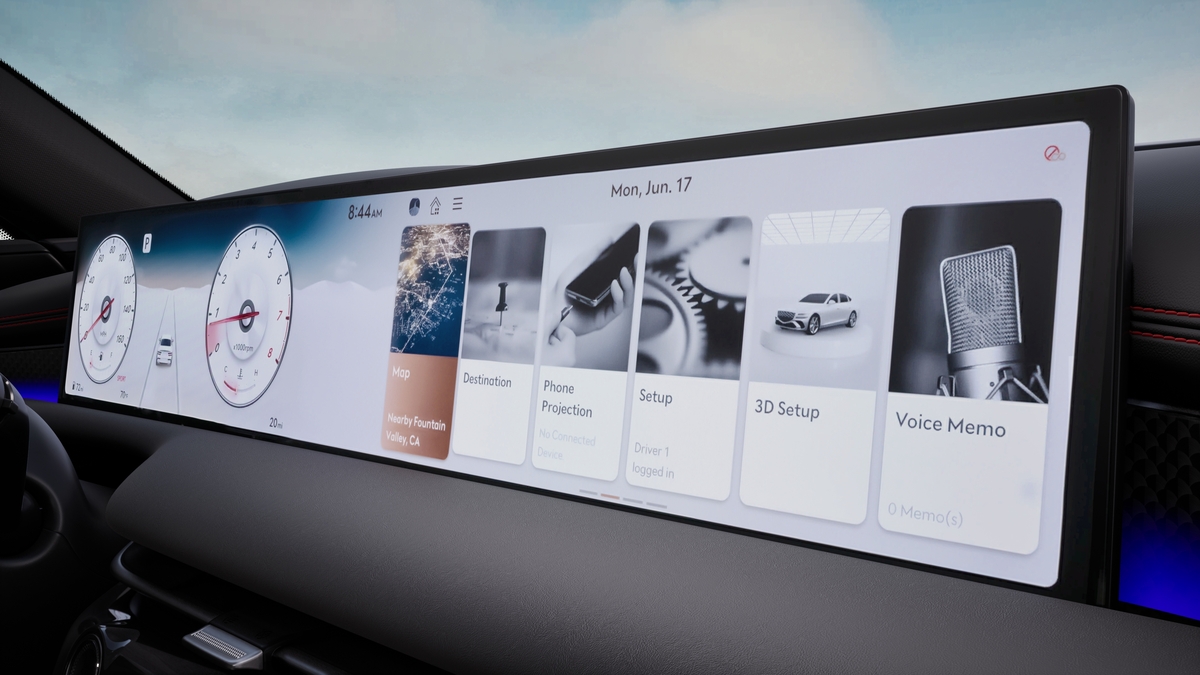 Interior close up of 27-inch OLED instrument cluster and navigation system inside Genesis G80