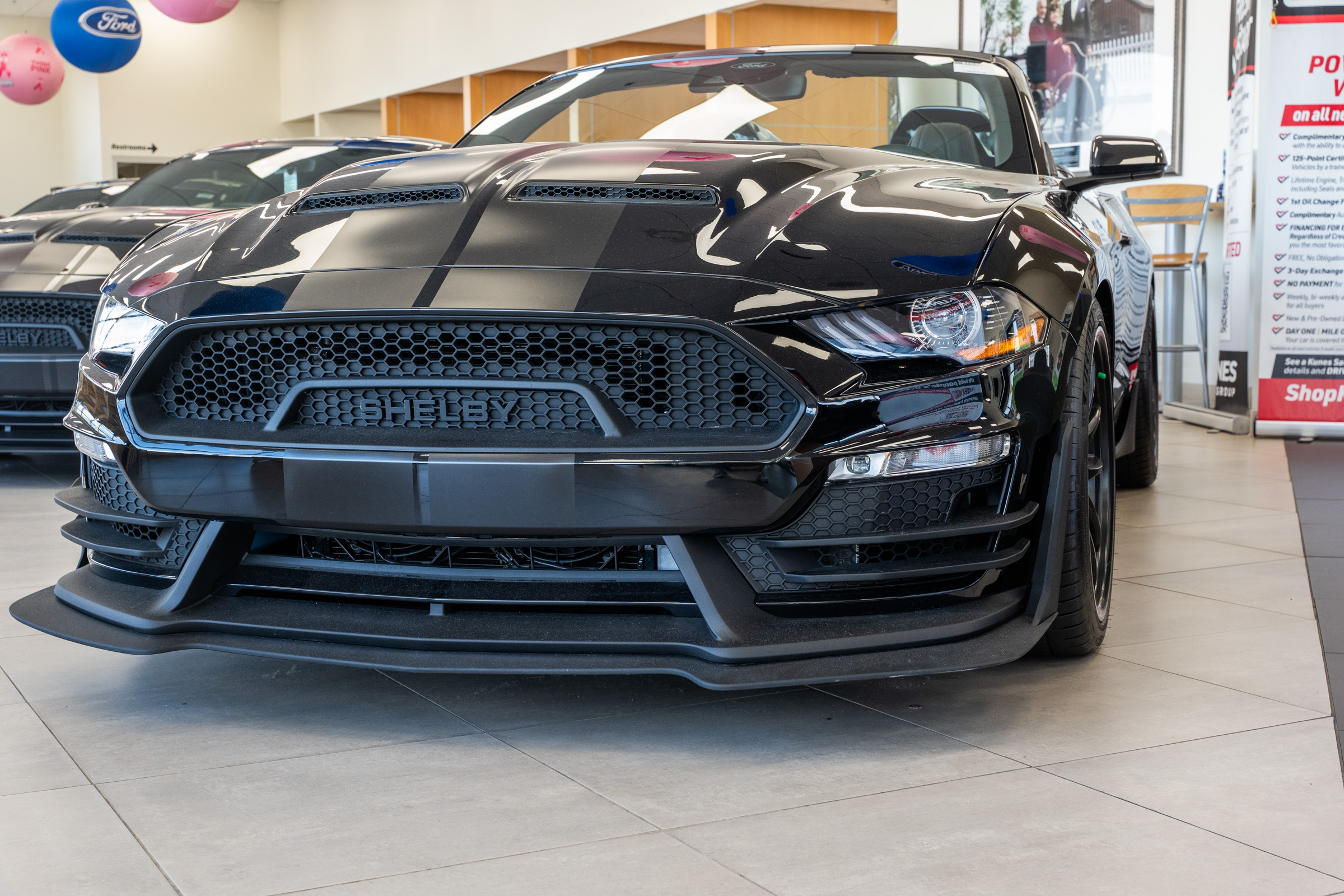 black shelby super snake inside of Kunes Ford of Delavan, WI