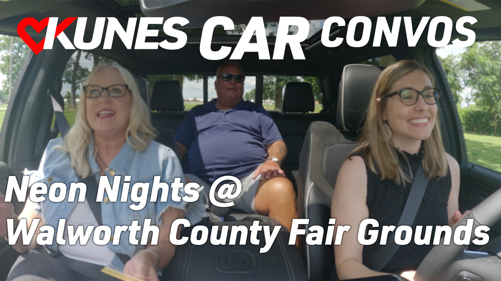 Pictured left to right: Melody Judge, Assistant Marketing Director, and Larry Gaffey, General Manager of Walworth Counto Fairgrounds, with Megan Swaney, Marketing Manager at Kunes Auto Group, riding inside of a 2025 RAM 1500 Laramie

Text reads: Neon Nights @ Walworth County Fair Grounds