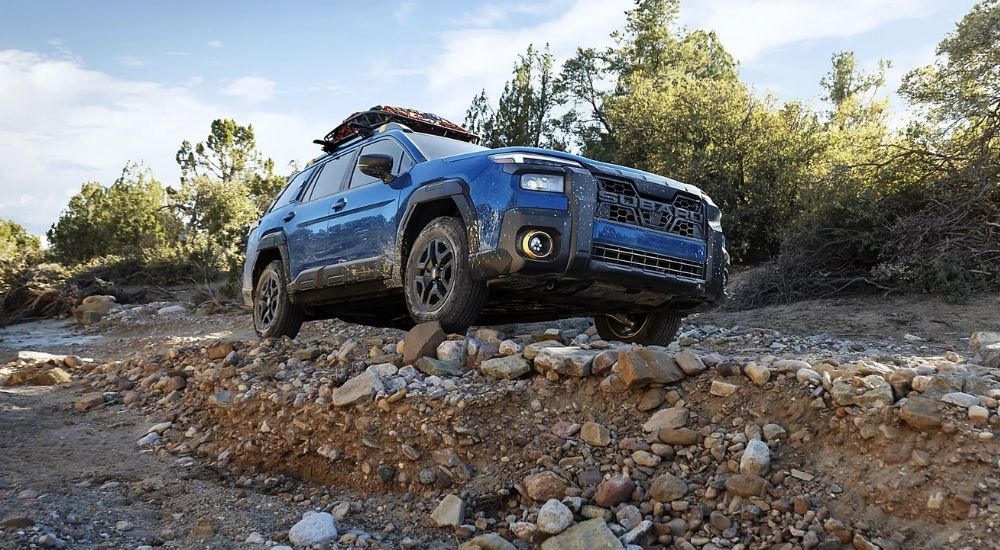 Blue 2026 Subaru Outback Wilderness off-roading