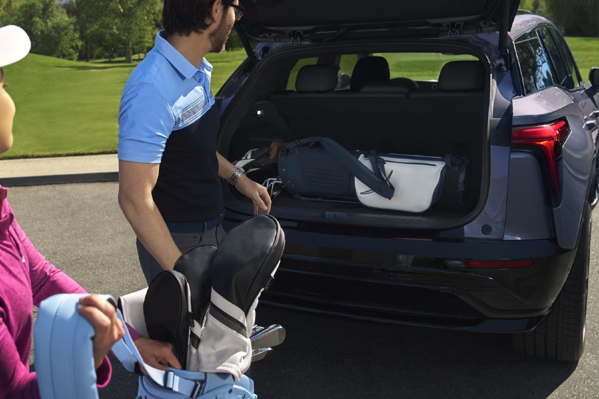 2025 Chevy Blazer EV Exterior Rear with Open Hatch and Owners Loading Cargo