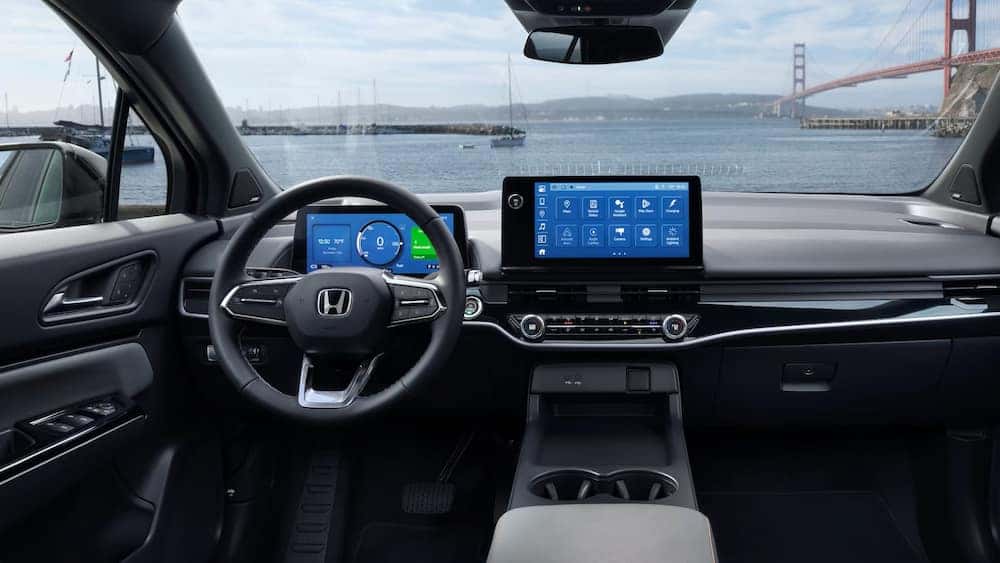The black and gray interior and dash are shown in a 2024 Honda Prologue.