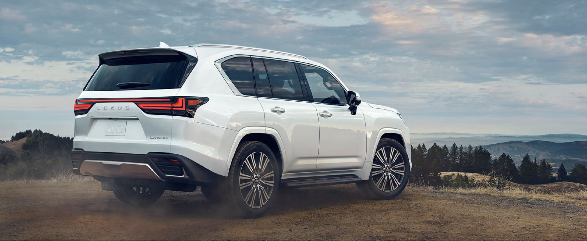 Lexus LX 600 parked on a scenic hilltop overlook