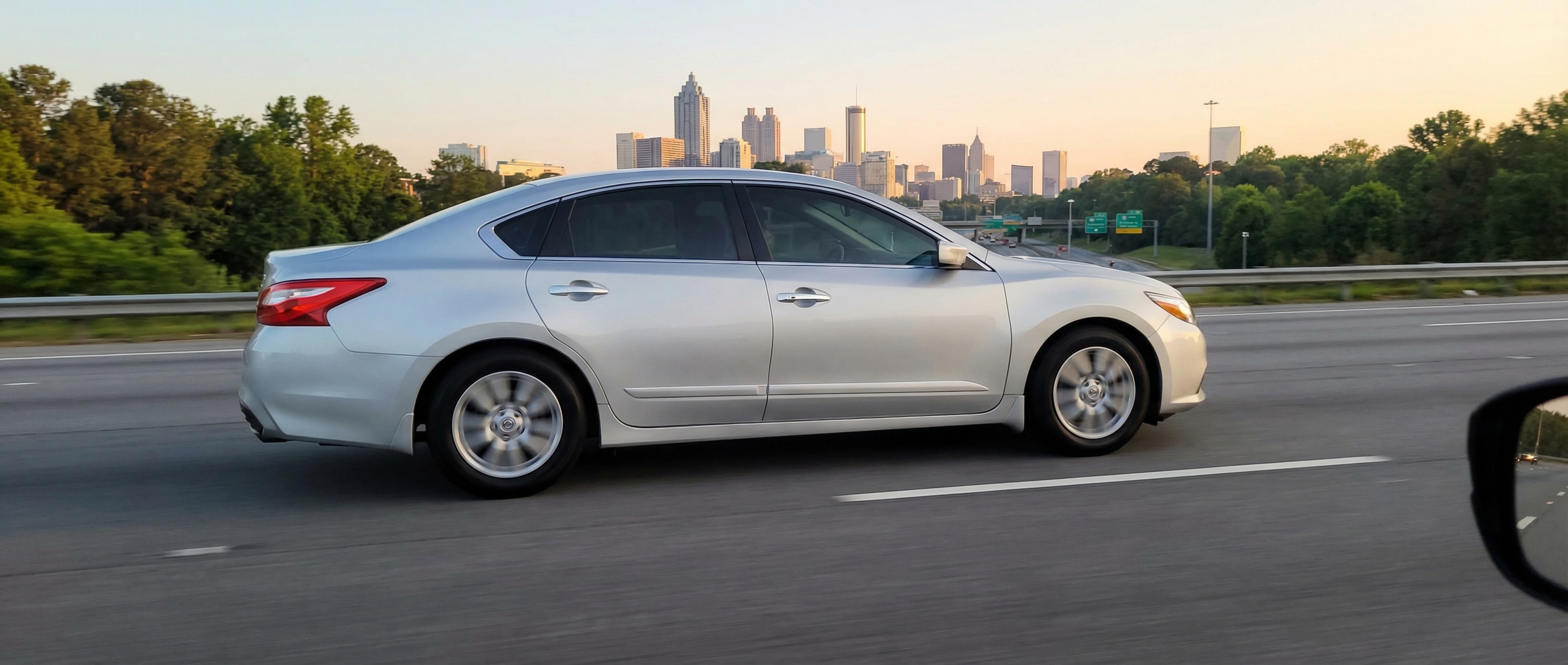 Nissan Altima efficient highway driving on GA-400 near Roswell, GA
