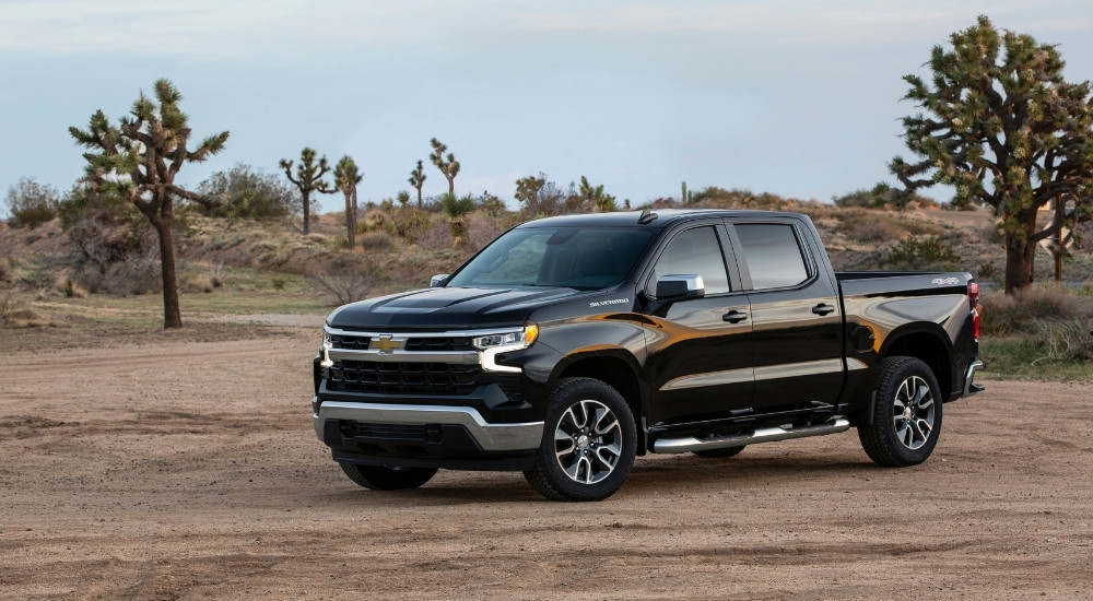 Black 2022 Chevy Silverado 1500 LT is shown off-road