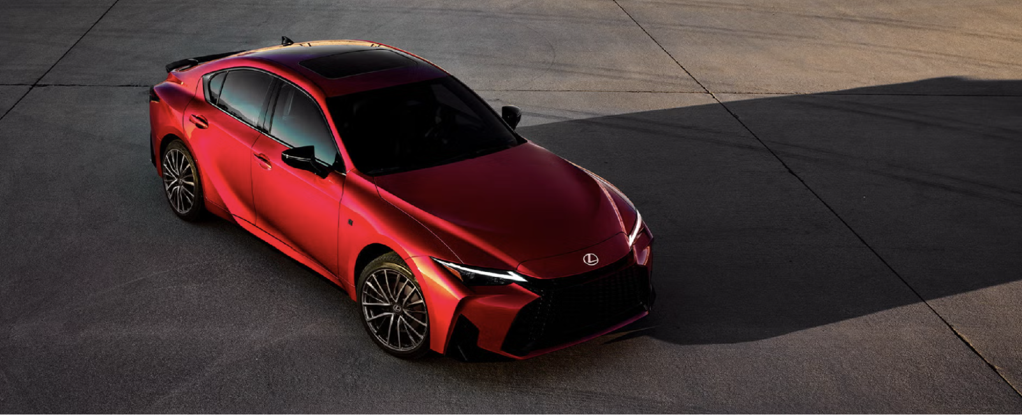 Lexus sport sedan viewed from above on a concrete lot