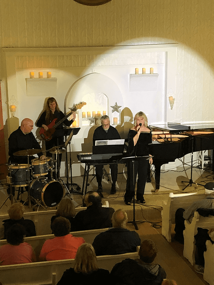 Musicians performing at Canby Pioneer Chapel