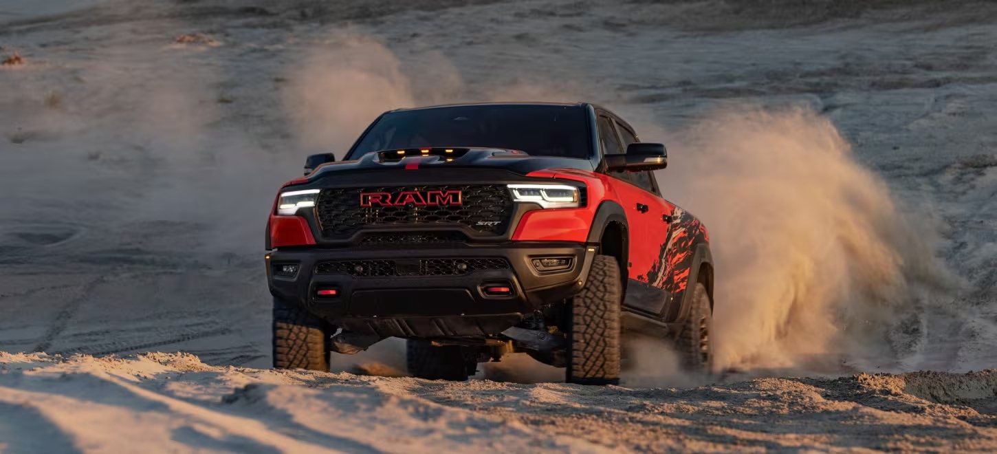 Red 2027 Ram 1500 TRX SRT Bloodshot Night Edition with black hood and roof