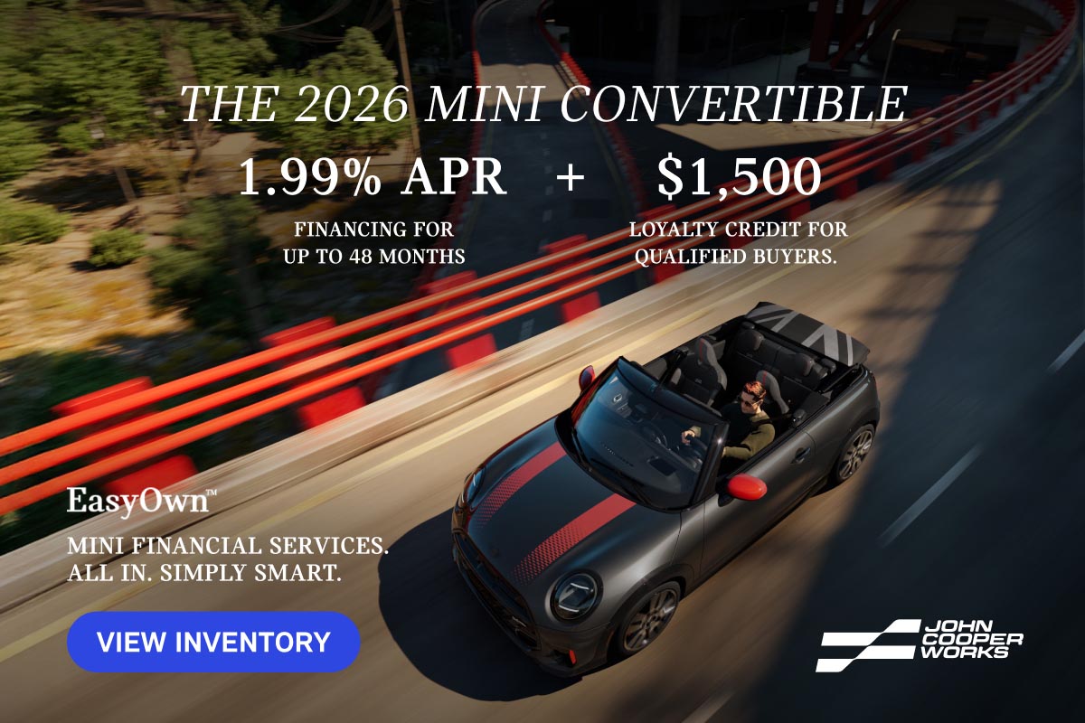 Overhead shot of MINI JCW Convertible driving on an elevated highway.