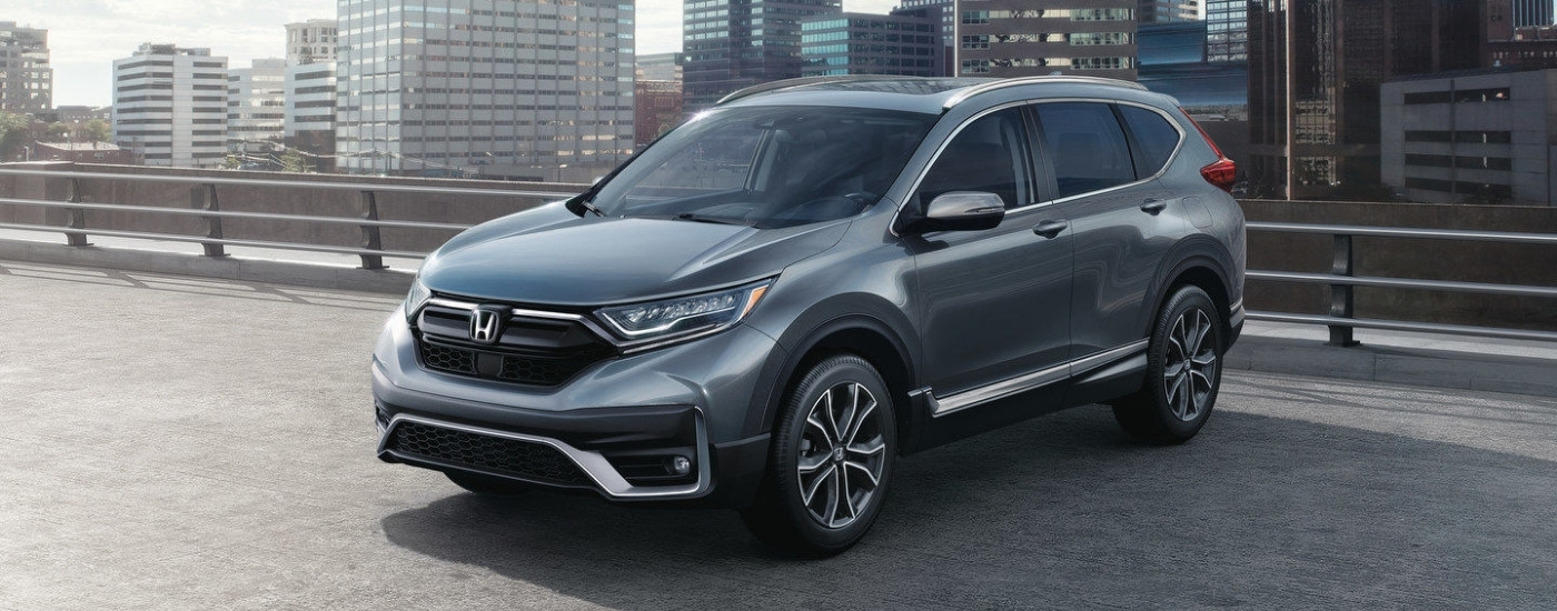 Gray 2020 Honda CR-V Touring parked atop a parking garage