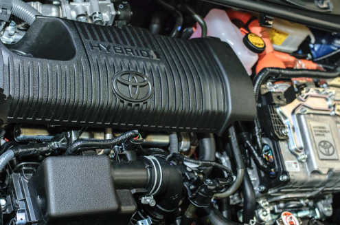 Toyota vehicle battery close up of engine bay.