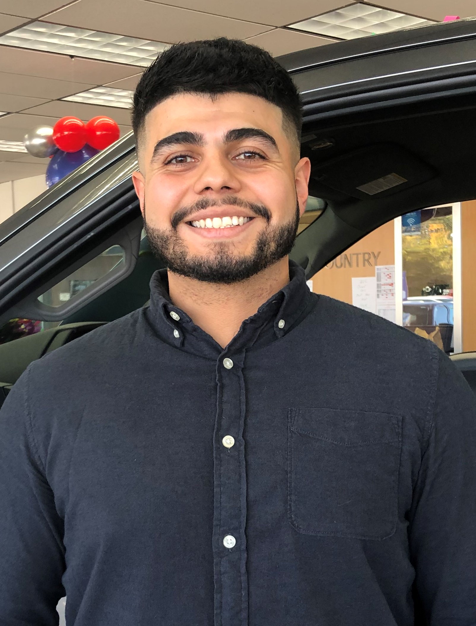 Kunes Auto Group bilingual Sales Representative, Miguel Renteria