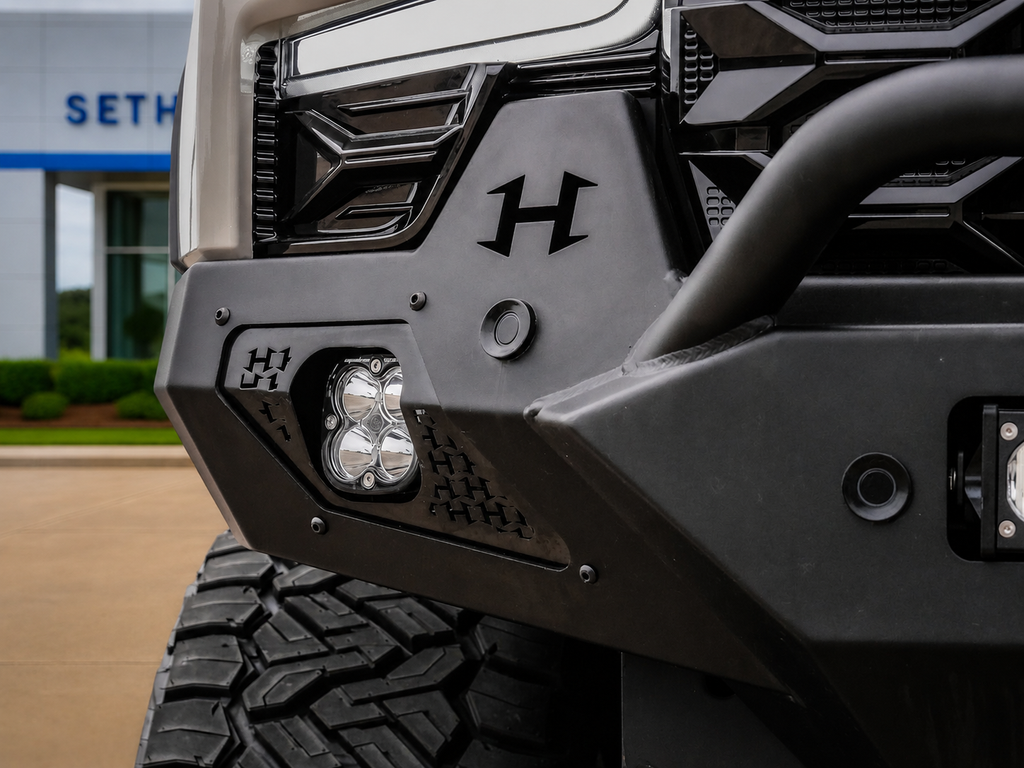 Hennessey bumper detail on a Chevrolet Silverado in dealership inventory