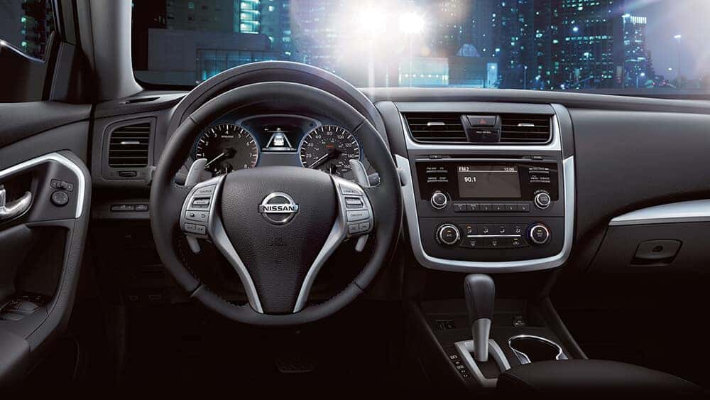 2017 Nissan Altima dashboard with steering wheel and center touchscreen
