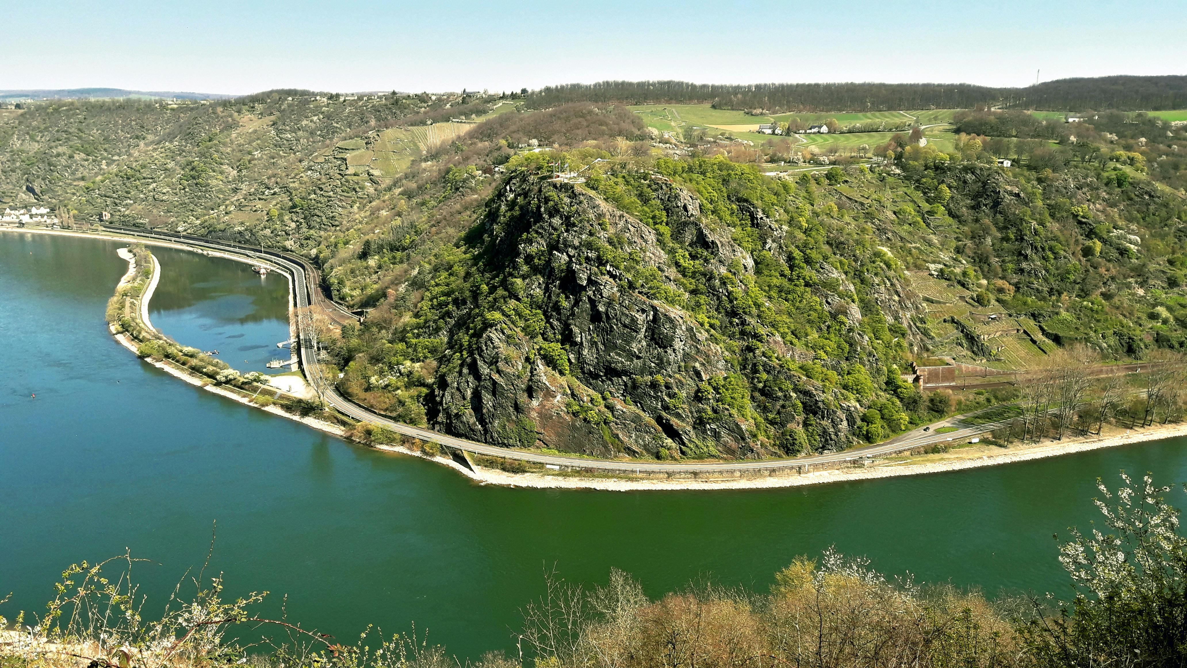 Modern family minivan driving on a suburban road