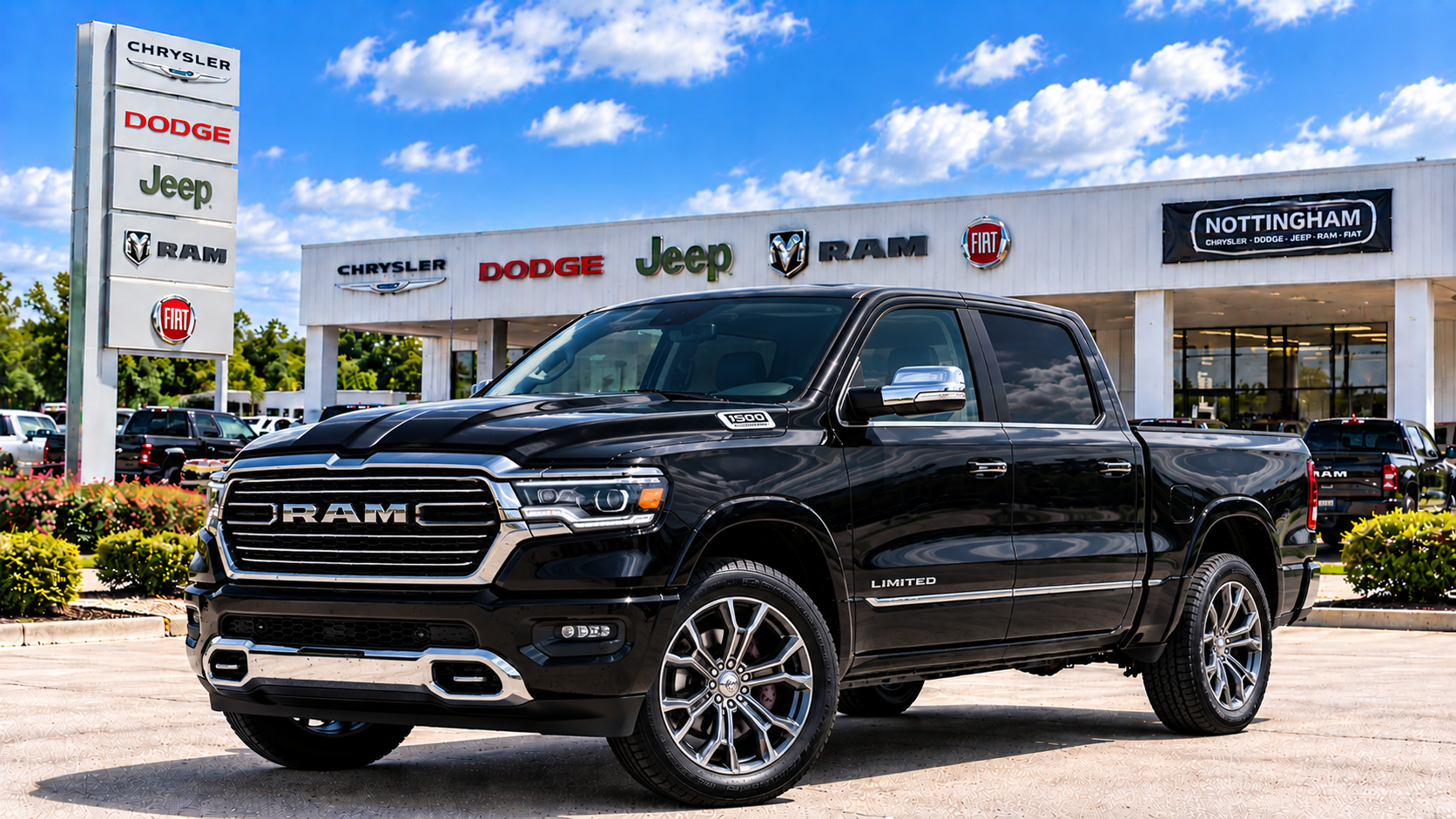 Black RAM 1500 Limited luxury pickup truck at Bonham Chrysler in Bonham, Texas