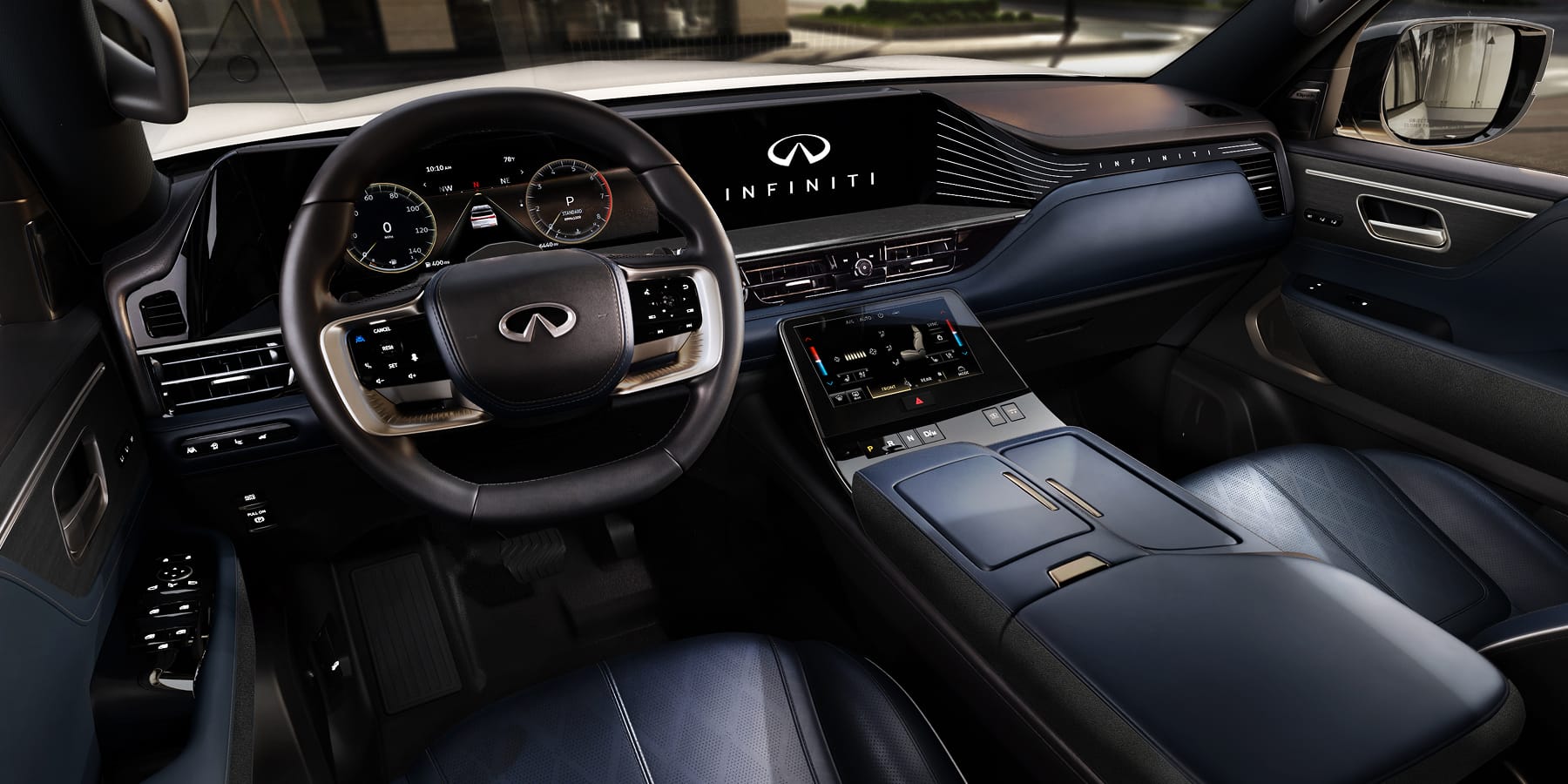 Driver's view of the 2027 INFINITI QX80 cockpit with a panoramic digital dashboard, lower climate touchscreen, and navy blue quilted leather seats.