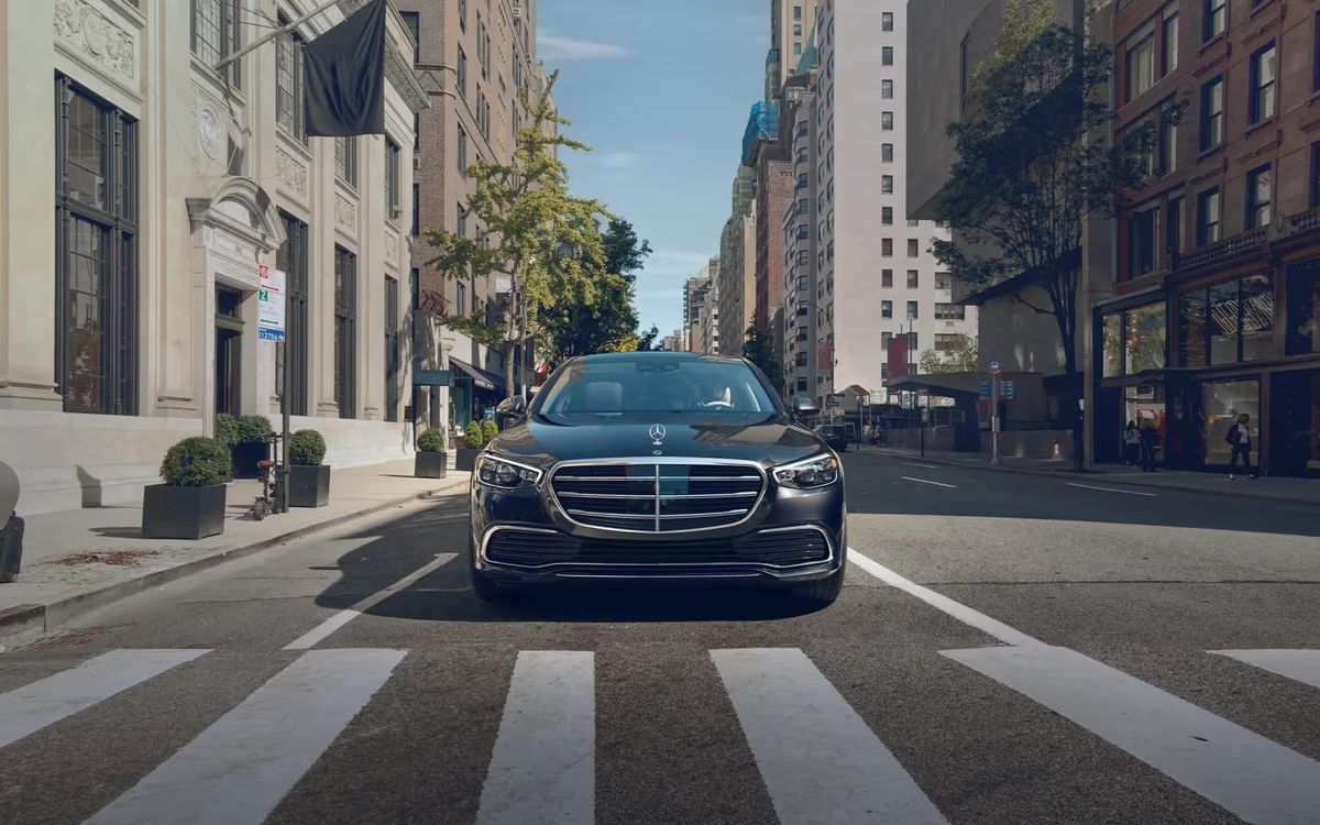 2026 Mercedes-AMG S 63 E Performance sedan on a city street, front view