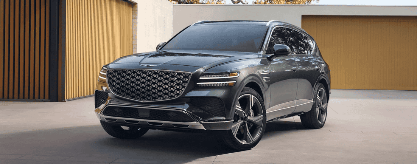 Black 2026 Genesis GV80 parked in a driveway