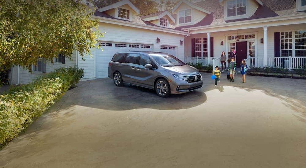 Silver 2025 Honda Odyssey parked on a driveway