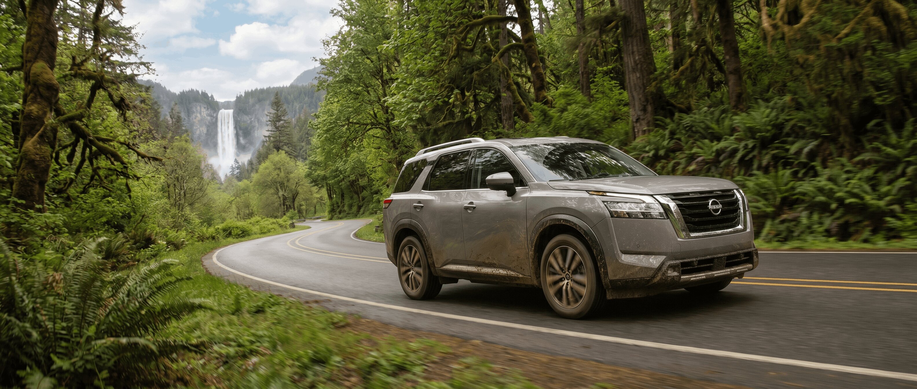Nissan Pathfinder AWD driving on a mountain road toward Amicalola Falls near Roswell GA.